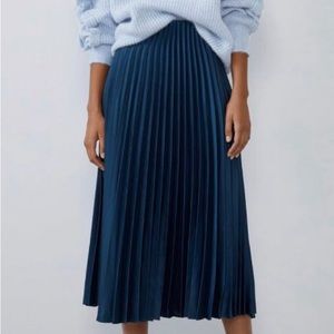 Pleated metallic blue skirt